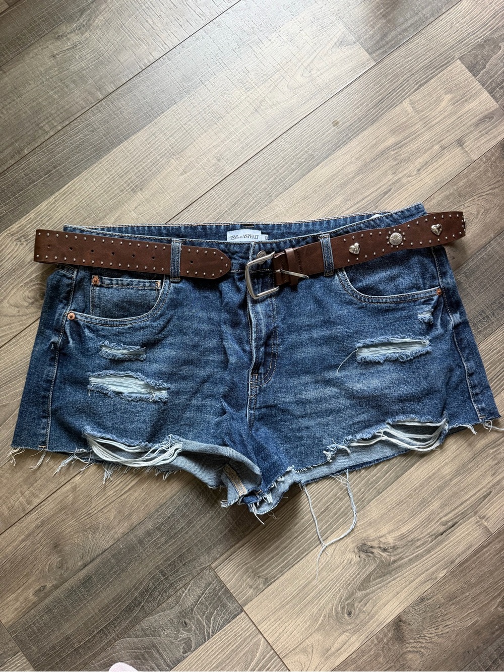 Jean shorts with a Brown Studded Heart Accent Leather Belt